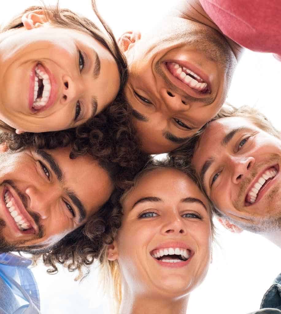 Smiling person showcasing white teeth after laser whitening treatment Croydon